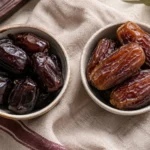 Mazafati vs Medjool dates side by side in two bowls