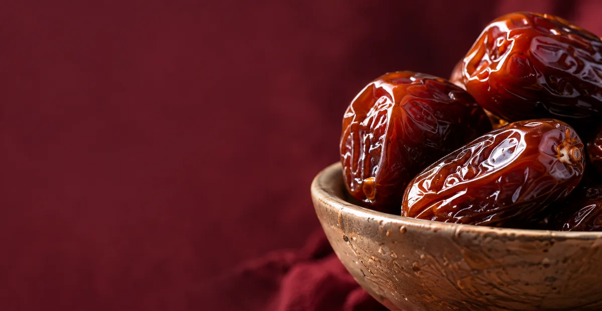 Bowl of glossy premium Medjool dates